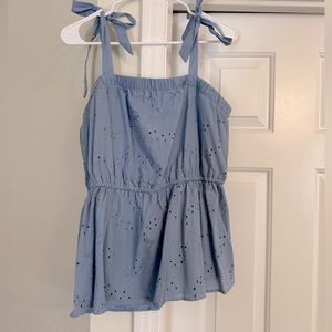 Women’s tank top, tie sleeves.